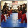 Practicing with sticks.