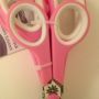 How do I get the plastic clip things off the scissors? 