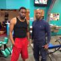 In the gym working hard with my trainer.