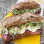Iedereen in Kralingen kent Albert’s Broodjes Corner. Ze hebben een specialiteitenkaart waar je een jaar voor nodig hebt om alle speciale broodjes te proberen. Het menu kent vele iconische bolletjes, triangels en pistoletten vernoemd naar onder meer het corps, RTC, AON en de Letter freak. Vooraan hier de Bobber met ei, rosbief, sla en mayonaise, ingepakt nog, want hij ging mee op reis. Het kleine winkeltje op de Slaak is een heus museum, met een serie blikken en conserven om verliefd op te worden. 
#kralingen #slaak #broodjes #debuikvanrotterdam