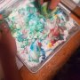 Dyeing eggs... food color and whipped cream.