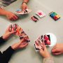 Always nice when my daughters are playing cards together... but wait, where did you get those cards?!?!?