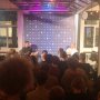 Enjoying @tqams’ first birthday, from the back of the room, with special guest Eric Schmidt...